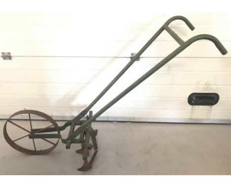 A vintage Wrigley Wessex Industries hand cultivator, with original name plate.  