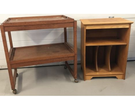 A vintage light wood open fronted record cabinet.  Together with a vintage teak 2 tier tea trolley with removable top tray.  