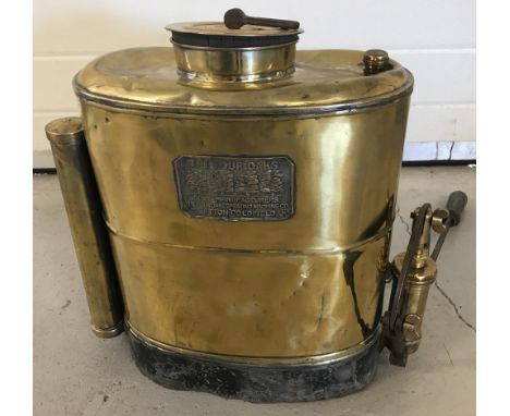 An Antique brass backpack sprayer by The Four Oaks Spraying Co Ltd, Sutton Coldfield.  Complete with sprayer attachment, back