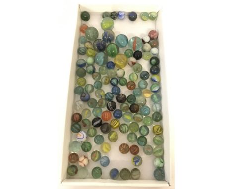 A collection of vintage marbles to include cat eye's, opaque's and swirlies.  