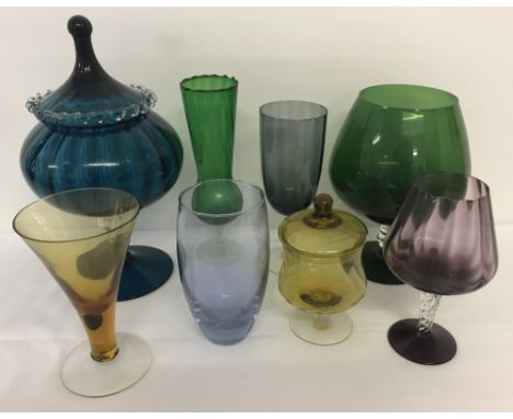  8 pieces of vintage and retro coloured glassware.  To include large ornamental  brandy glasses and lidded stemmed bowls. 