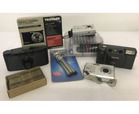 A box of 5 digital and vintage cameras and accessories. To include a Praktica D Pix 5200; a Miranda A-X autofocus; a Kodak Sc