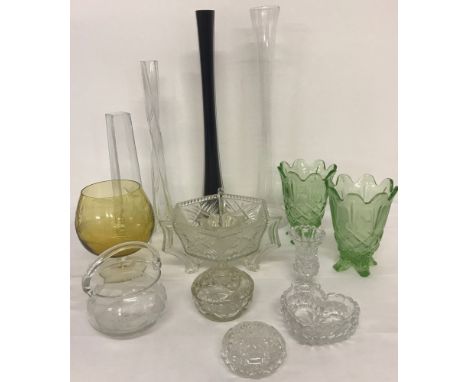 A quantity of vintage clear and coloured glass items.  To include twisted stem art glass vases, large etched ornamental brand