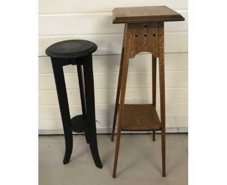 2 vintage wooden plant stands. A dark wood circular topped stand on 3 legs.  Together with a medium oak square topped stand o