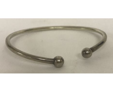 A silver torque bangle.   Being sold on behalf of Hillside Animal Sanctuary.