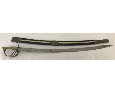 A vintage eastern curved sword in scabbard with brass trim and blue velvet cover.  Blade marked "Made in India".  Approx. 89.