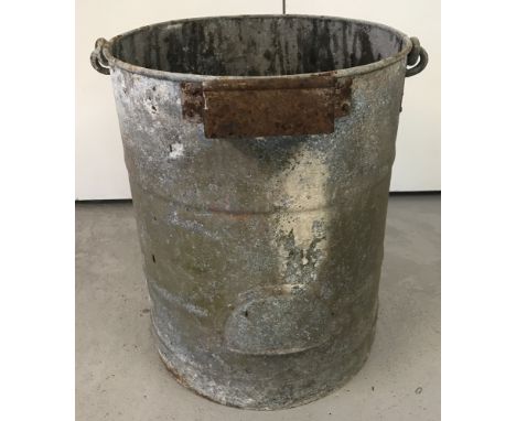 A vintage galvanised closet bucket with carry handle, pouring handle and bracket for hinged lid.   Approx. 42cm tall x 34.5cm