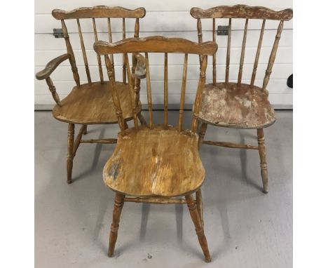 3 matching pine vintage kitchen chairs with turned detail to legs and spindles.  One carver and 2 chairs. 