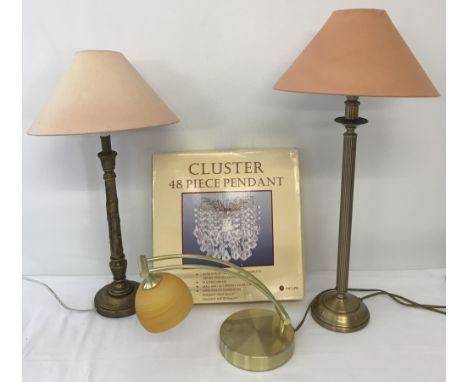 A modern brass desk lamp with glass shade.  Together with a brass effect column table lamp, a gold painted  leaf design table