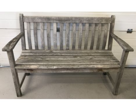 A vintage wooden slatted garden bench.   Approx. 127cm long.