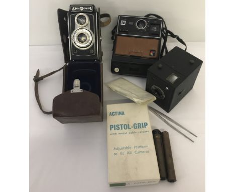 A collection of 3 vintage cameras &amp; photographic equipment. To include a Montanus DelMonta with Pluscanar anastigmat lens