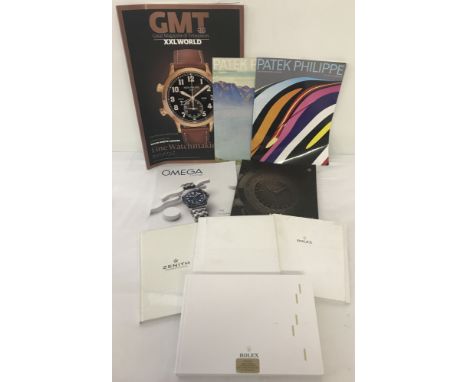 A collection of watch catalogues and magazines.  Comprising: 3 x Rolex, Zenith, 3 x Patek Philippe, Omega and GMT magazine. 