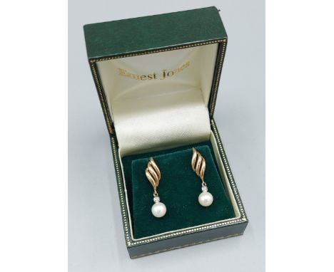 A pair of 9ct gold Pearl and Diamond set drop ear studs 