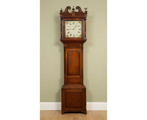 A 19th century oak thirty-hour longcase clock with a painted dial and complete with pendulum and weight, 53cm wide x 25.5cm d