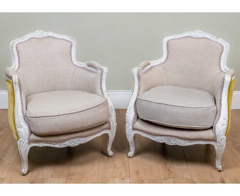 A pair of modern Graham &amp; Green upholstered open armchairs, each 67cm wide x 62cm deep x 79cm high