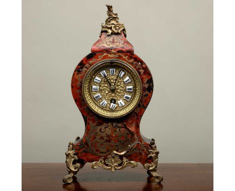 A 19th Century mantle timepiece or clock, in the boulle style, 16.5cm wide x 29.5cm highMissing pendulum, no key, in need of 