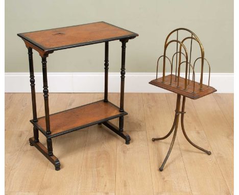 A Victorian two-tier Amboyna and ebony rectangular topped occasional table with decorative banding to the top and on turned f