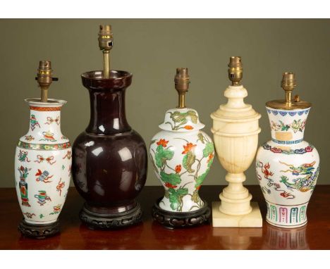 A group of five various table lamps to include one in the Oriental style with an aubergine-coloured glaze; and a turned Itali
