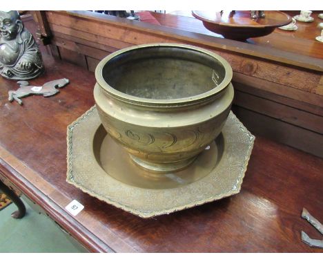 A 19th Century Chinese brass planter, the surface decorated with an engraved celestial dragon (crack to rim) height 205mm, al