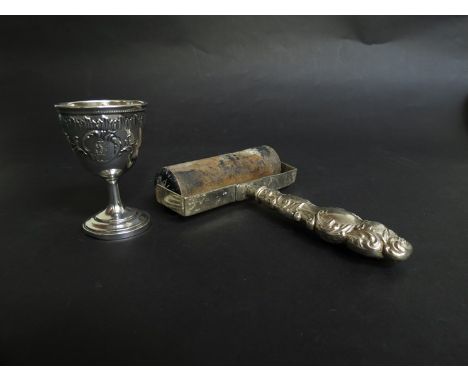 A Continental silver egg cup and silver ink roller by Levi & Salaman, Birmingham 1902