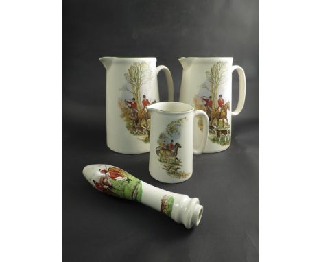 Three graduated 'Heroncross' jugs with a hunting theme transfer print and a bygone ceramic beer pull 