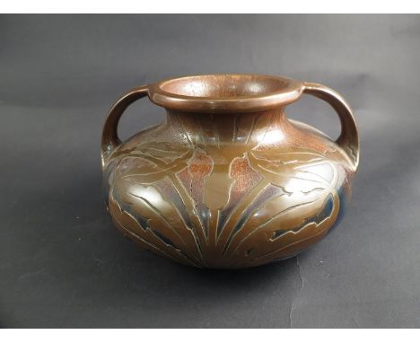 An Art Nouveau pottery and copper squat form twin handled bowl, a/f 
