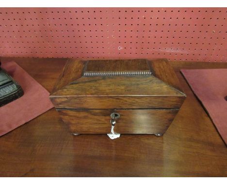 A 19th Century rosewood tea caddy with key, 20cm long