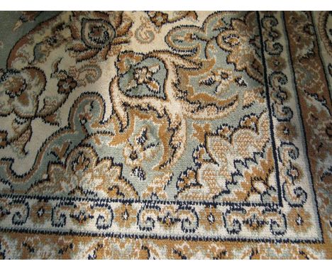 A green Keshan carpet 2.3 x 1.6m