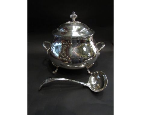 A silver plated soup bowl with figured knop to lid with ladle