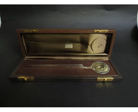 A Garrard & Co Ltd silver Sir Winston Churchill commemorative paper knife designed by John Churchill & Alex Styles No 23/100 