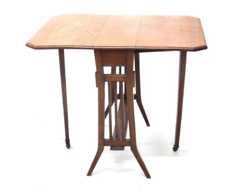 An Edwardian Sutherland gate leg table, with canted top, on sabre stiles, when closed 62cm high, 61cm wide, 19cm deep. 