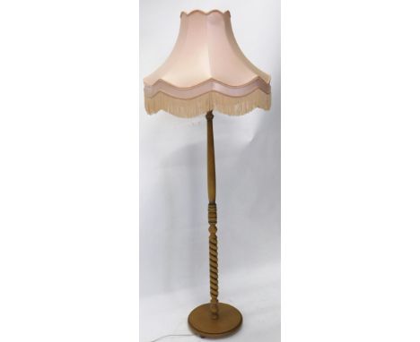 A lamp standard, with pink shade, 156cm high. 
