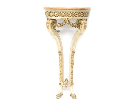 A Continental white painted and parcel gilt wood console table, the pink variegated marble demi lune top, above a pierced fri