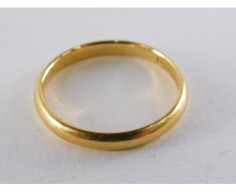 A 22ct gold wedding band, of plain design, ring size N½, 3g all in.