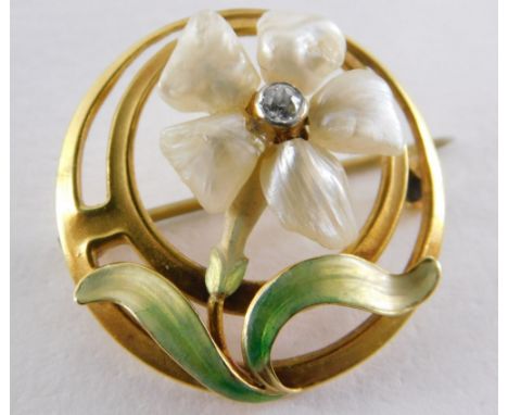 A diamond blister pearl and enamel circular brooch, the pierced design setting set with a white flower, with central diamond 