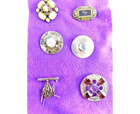 Six Scottish and other brooches, to include a Miracle Scottish Celtic cross agate brooch, silver enamel brooch, a Stanetzky s