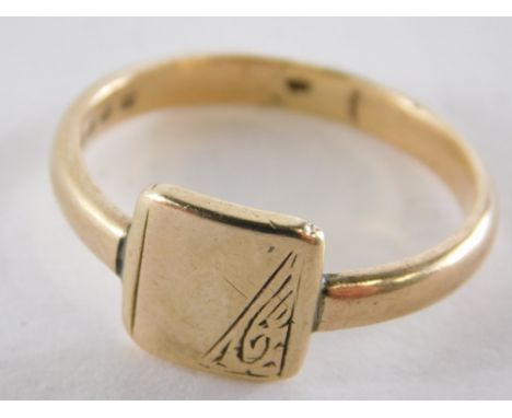 A 9ct gold signet ring, with square set panel, half engraved, on a plain band cut, ring size Q½, 3.3g.