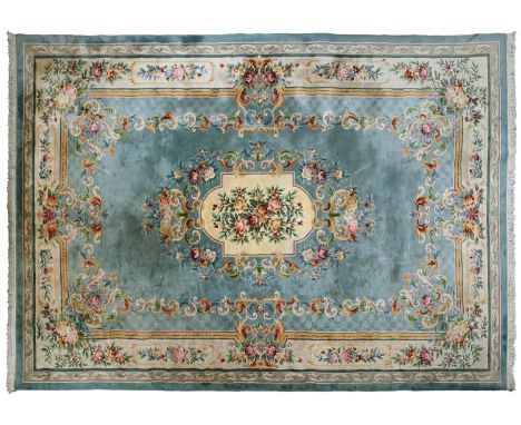 A Chinese silk carpet, 369 x 567cm 