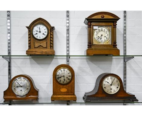 A German mahogany architectural type mantle clock, early 20th c, brass mounted silvered dial flanked by a pair of turned pila