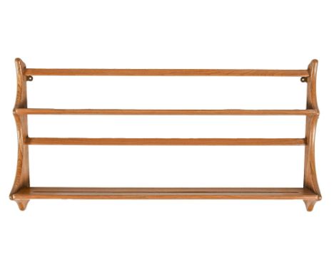 An Ercol elm and contrasting lightwood 268 plate rack, 96.5cm l, maker's label  Good condition