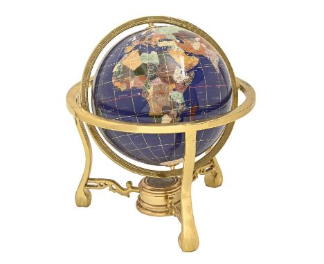 A polished hardstone terrestrial globe, 20th c,&nbsp;with tripod brass stand and compass, 32cm h  Overall condition good