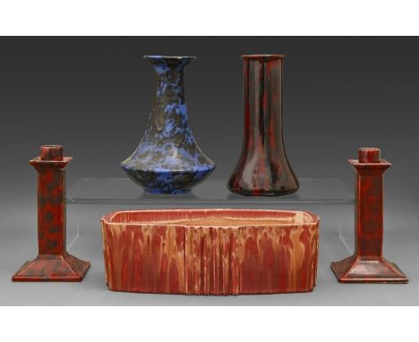 A Wescontree Candy Ware earthenware art deco jardiniere, a pair of candlesticks, and two bottle vases, early 20th c, red and 