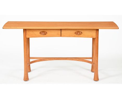 An Ercol limited edition ash Kelmscot side table, designed by Don Pedel, 1987, 74cm h; 48 x 149cm, with slate tablet signed b