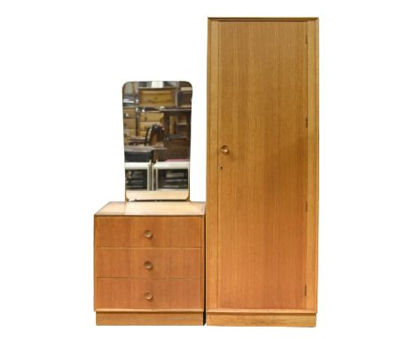 A Meredew mid-century light oak bedroom suite, comprising three wardrobes, 176cm h and smaller, chest of drawers, 117cm h; 46