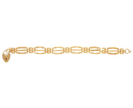 A gold gate bracelet and padlock, 17.5cm l, marked on padlock 9ct, 7.4g  Slight damage