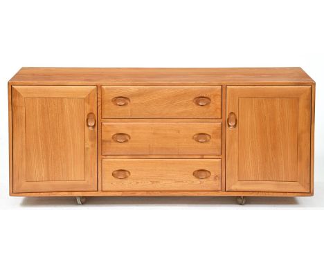 An Ercol elm 455/2073 sideboard, on castors, 68cm h; 43 x 155cm  Good condition