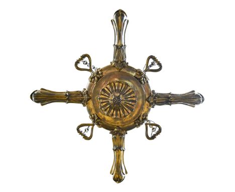 A George IV brass colza chandelier, of four foliate cast branches alternating with loops and bolted to the central leafy rose