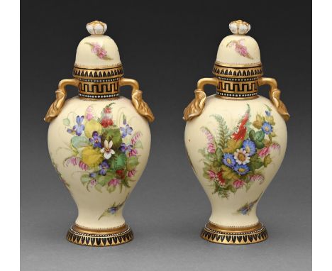 A pair of Coalport vases and covers, c1880, with gilt lily pad handles and painted with heaths on a primrose ground, between&