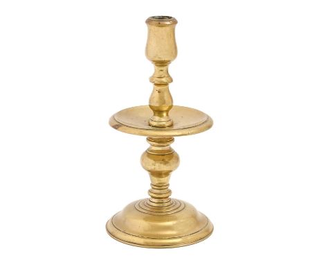 A Dutch brass candlestick,&nbsp;18/19th c, 25cm h 