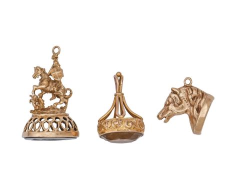 Three 9ct gold fob seals, 20th c, each with cornelian or other intaglio, one engraved with St George and the Dragon, 37mm h, 